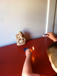 B practices lighting incense